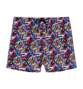 Colorful geometric patterned shorts on a white background